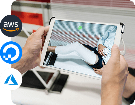 A concept of cloud hosting for fitness apps highlighting a tablet screen with AWS, DigitalOcean and Azure logos